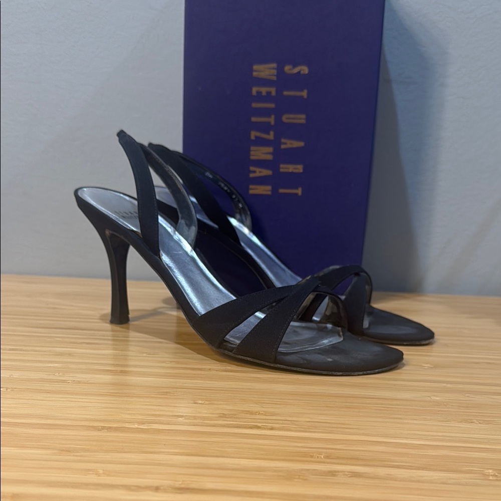 Stuart Weitzman Black Heels with Strappy Design and Tall Stiletto